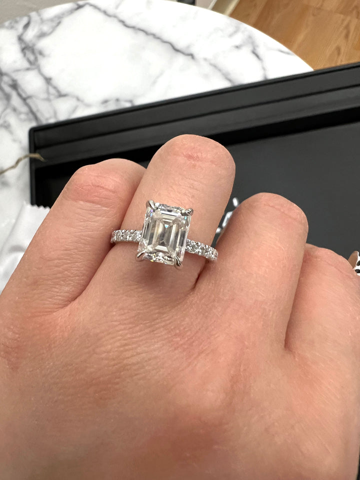 Emerald Cut Hidden Halo &amp; Round Side Stones Engagement Ring