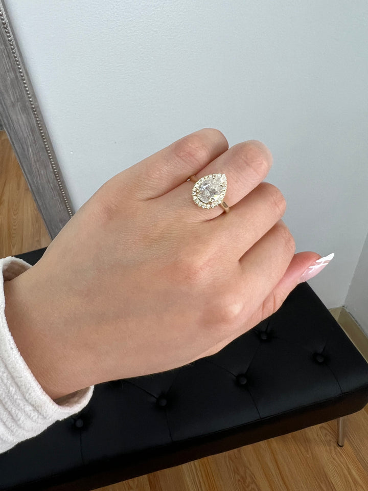 Pear Shape Engagement Ring with Halo Center and Plain Band