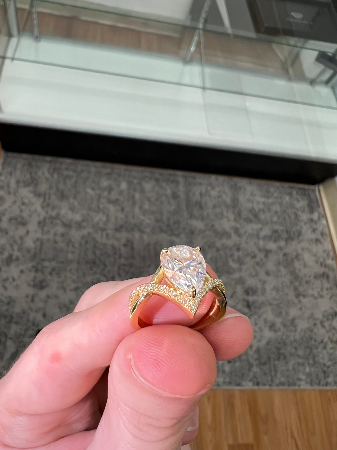 Pear Shape Engagement Ring With Twisted Pavé Band