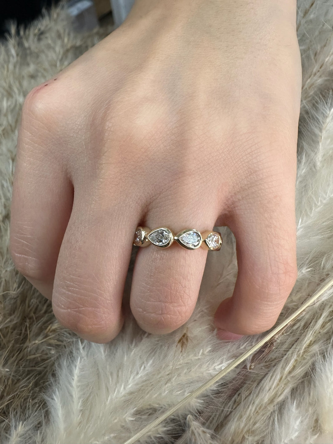 Bezel Set East To West Pear Shape Eternity Band