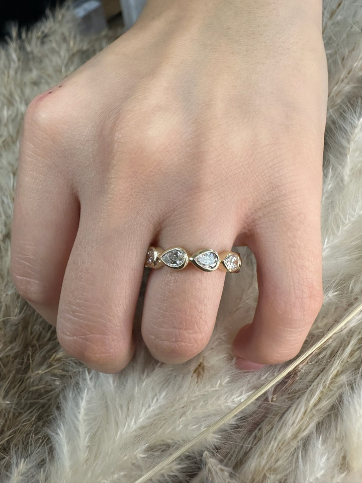 Bezel Set East To West Pear Shape Eternity Band