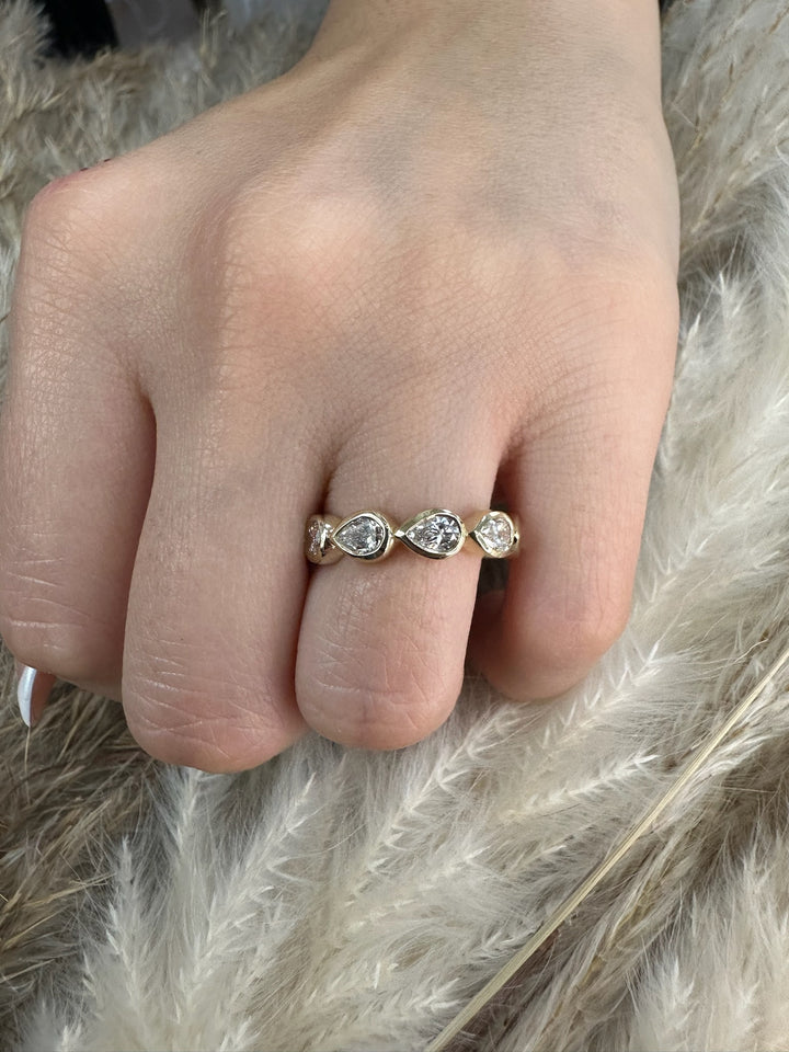 Bezel Set East To West Pear Shape Eternity Band