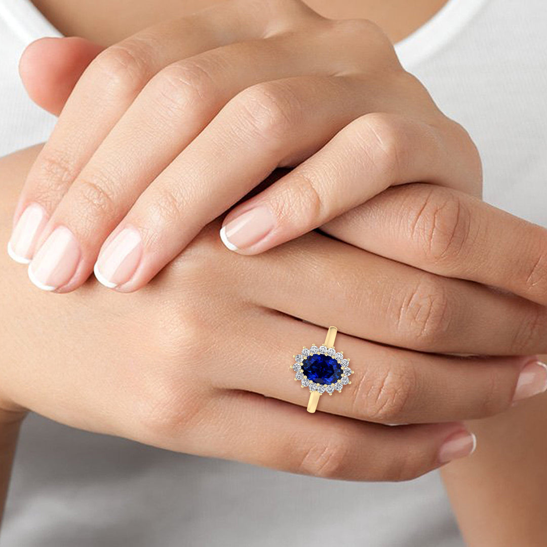 Oval Cut Blue Sapphire &amp; Halo Engagement Ring