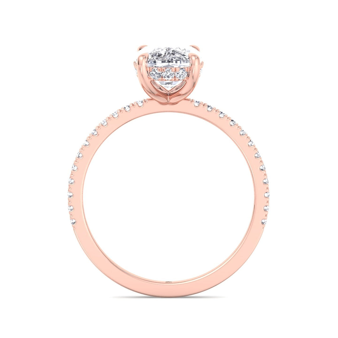 Elongated Cushion Cut Engagement Ring With Sidestones and Hidden Halo