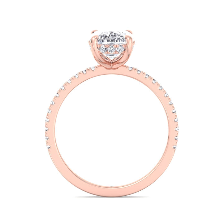 Elongated Cushion Cut Engagement Ring With Sidestones and Hidden Halo