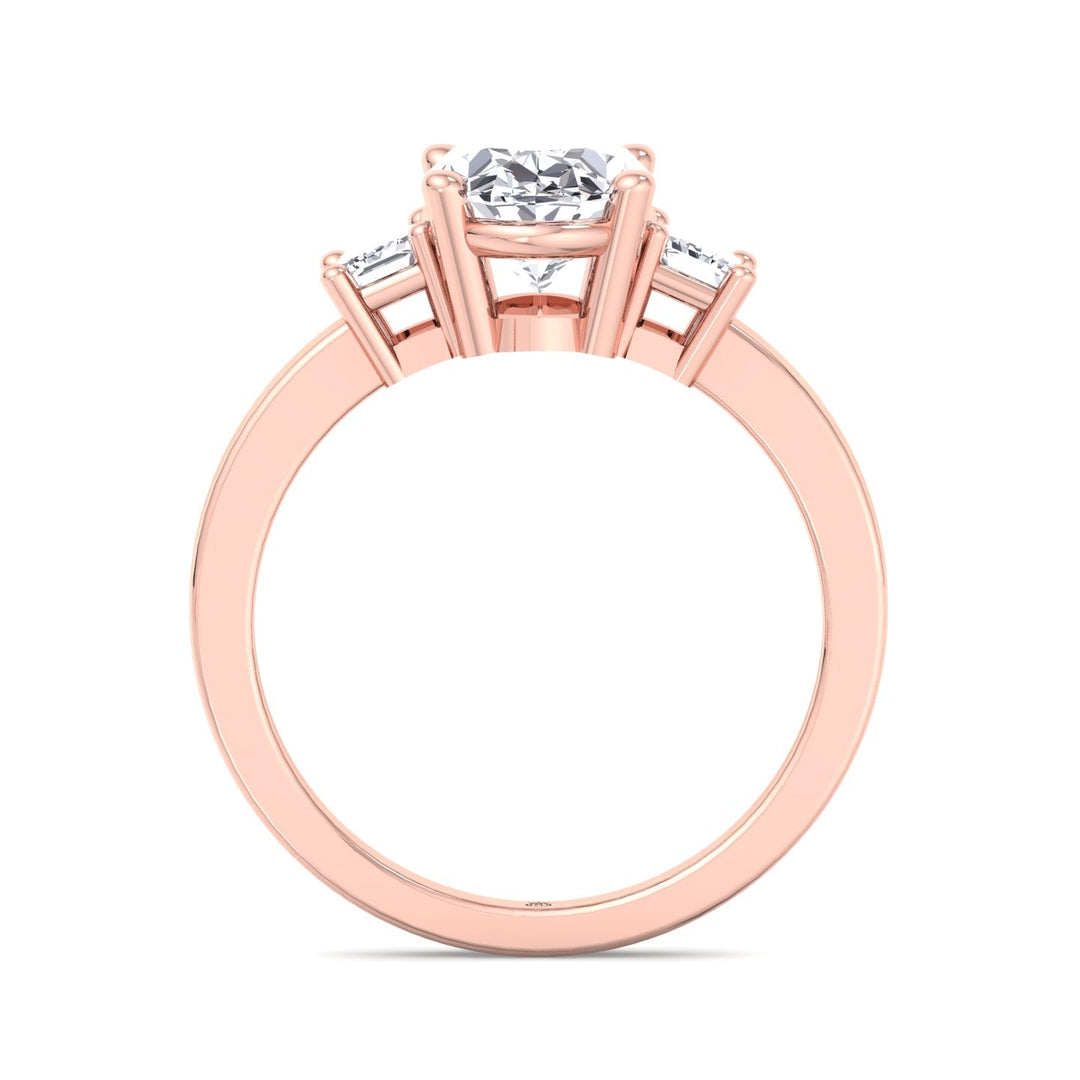 Oval Cut Engagement Ring with Emerald Side Stones