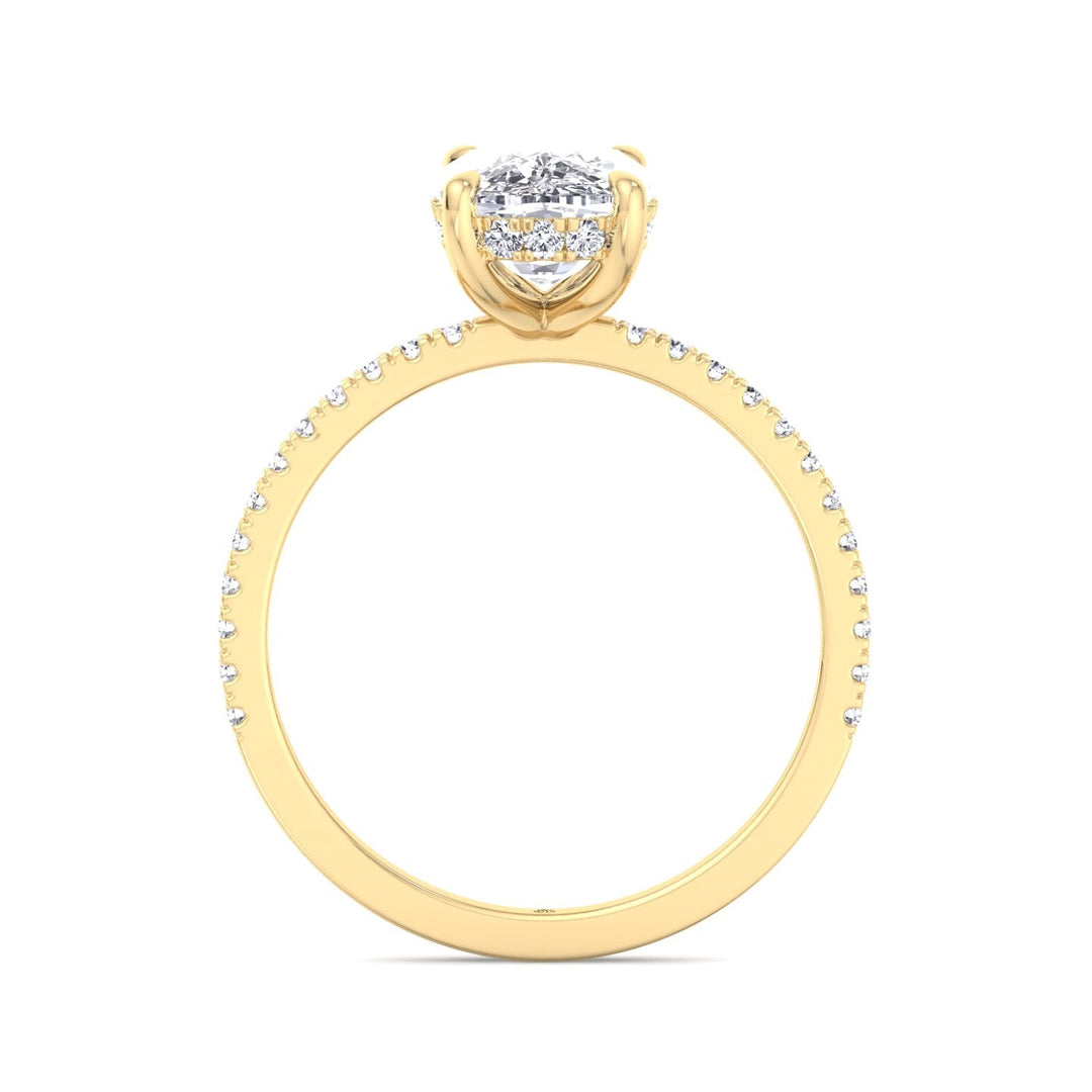 Elongated Cushion Cut Engagement Ring With Sidestones and Hidden Halo