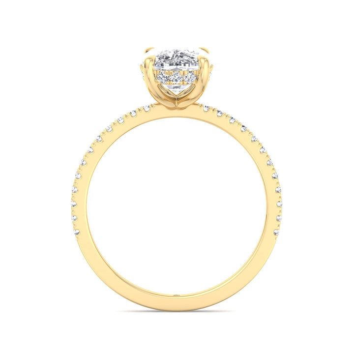 Elongated Cushion Cut Engagement Ring With Sidestones and Hidden Halo