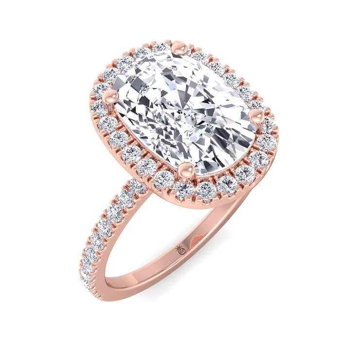 Elongated Cushion Cut Halo Engagement Ring With Sidestones