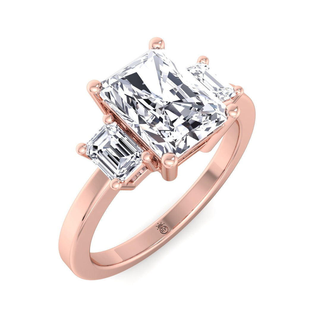 Radiant Cut Engagement Ring with Emerald Sidestones