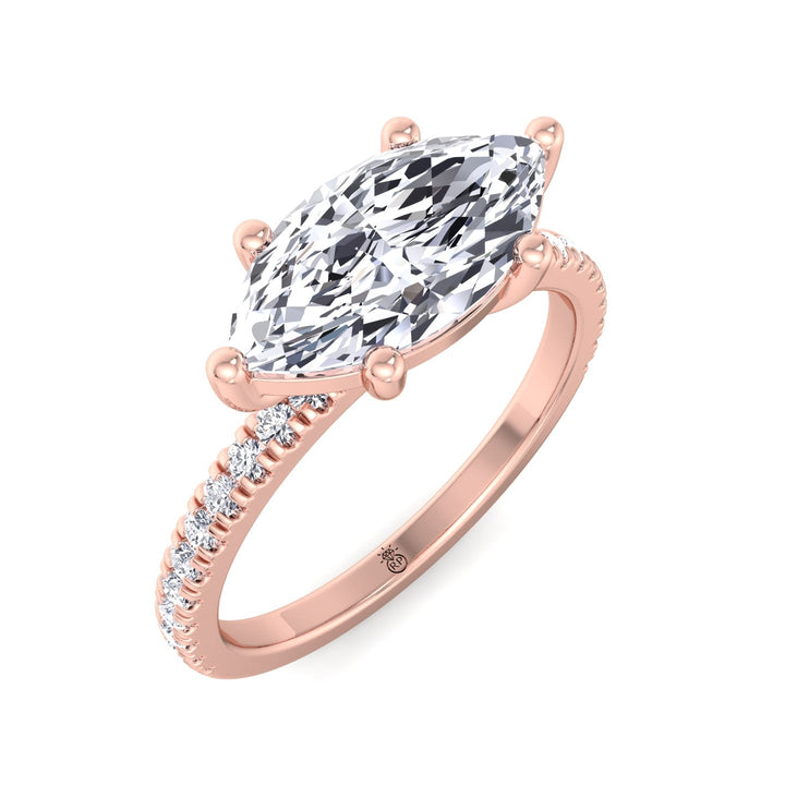 East to West Marquise Cut Engagement Ring With Sidestones