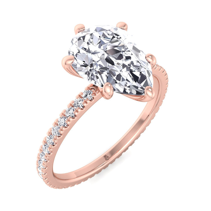 Pear Shape Engagement Ring with Round Side Stones