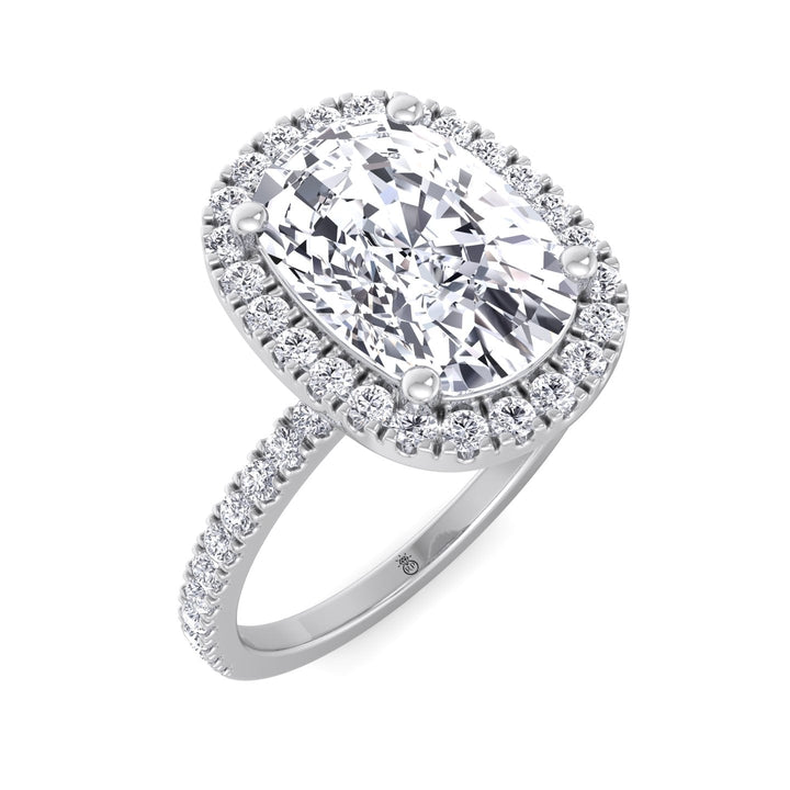 Elongated Cushion Cut Halo Engagement Ring With Sidestones