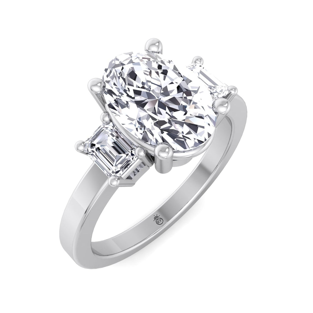 Oval Cut Engagement Ring with Emerald Side Stones