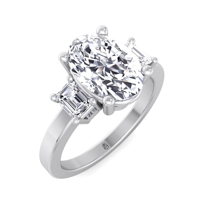 Oval Cut Engagement Ring with Emerald Side Stones