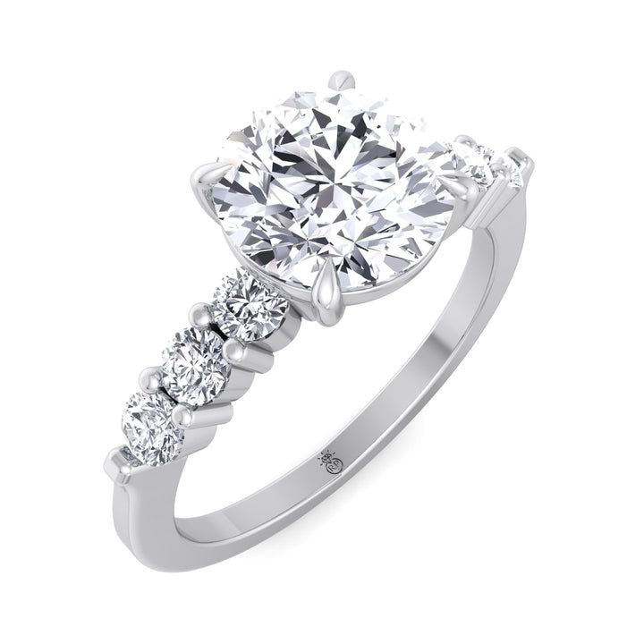 Round Cut Engagement Ring with Sidestones
