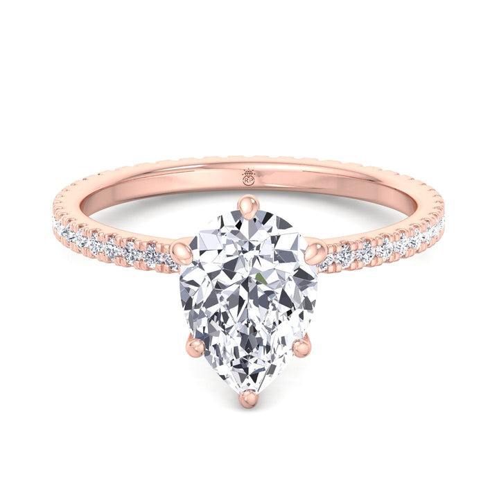 Pear Shape Engagement Ring with Round Side Stones