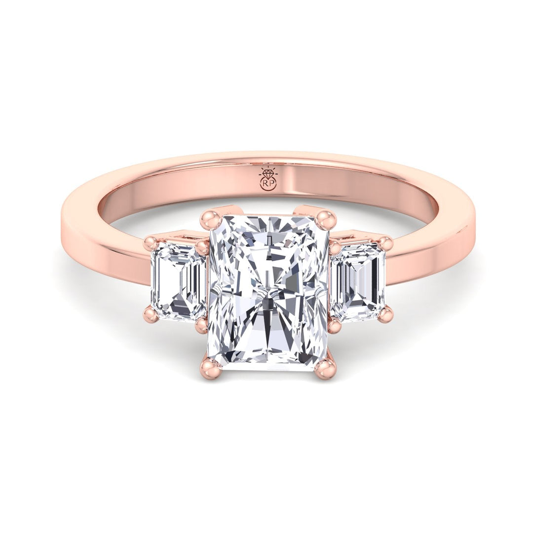 Radiant Cut Engagement Ring with Emerald Sidestones