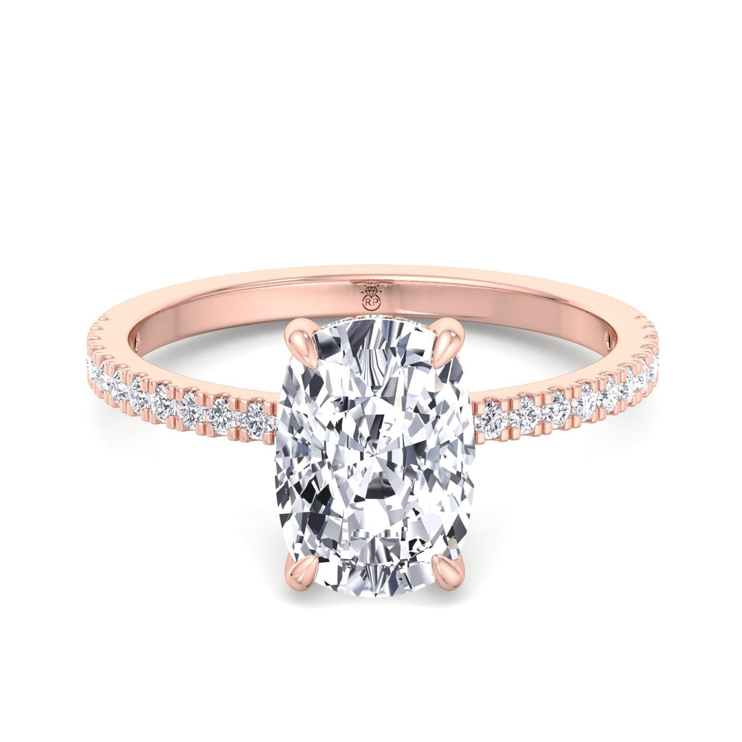 Elongated Cushion Cut Engagement Ring With Sidestones and Hidden Halo