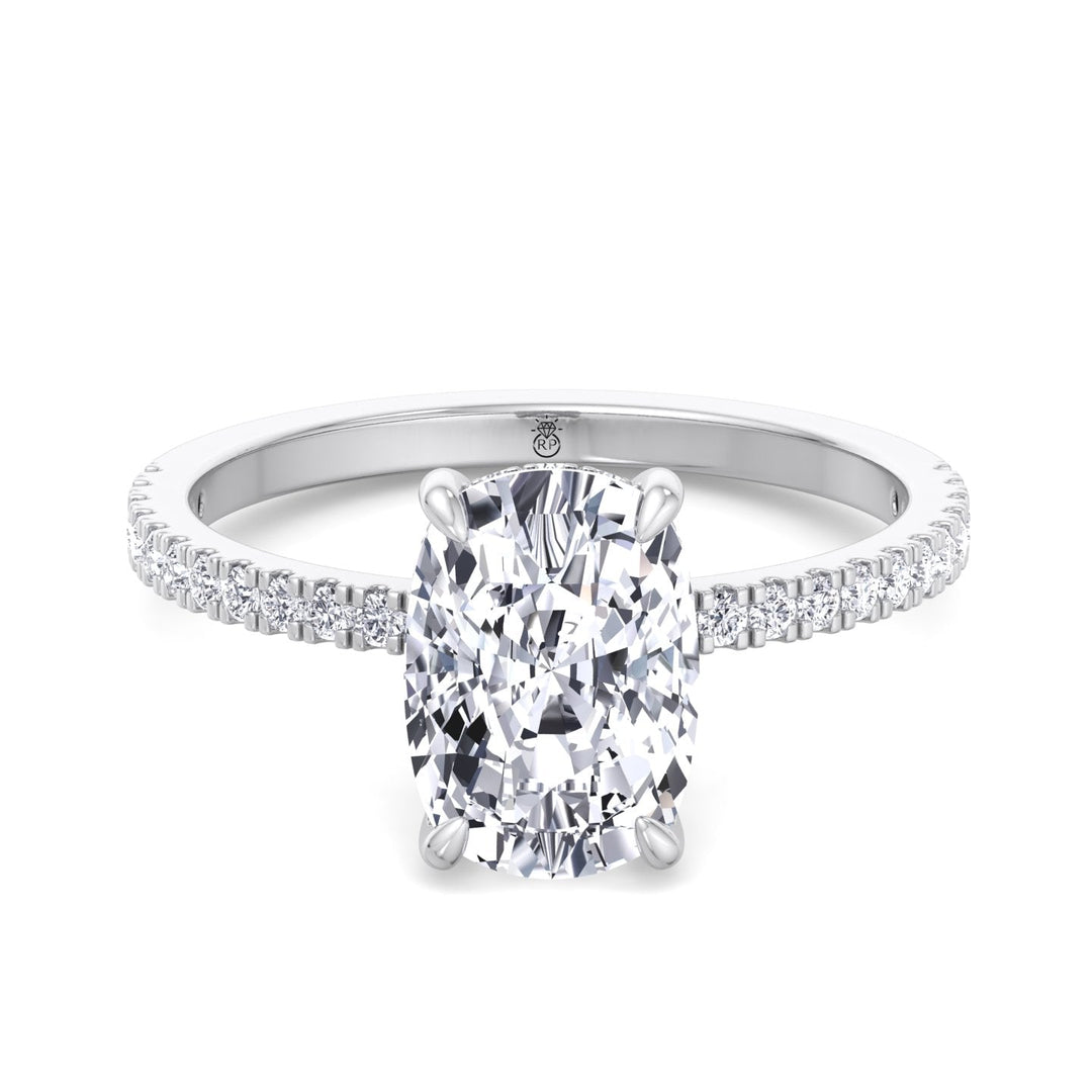 Elongated Cushion Cut Engagement Ring With Sidestones and Hidden Halo