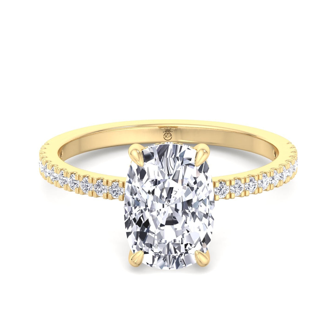 Elongated Cushion Cut Engagement Ring With Sidestones and Hidden Halo