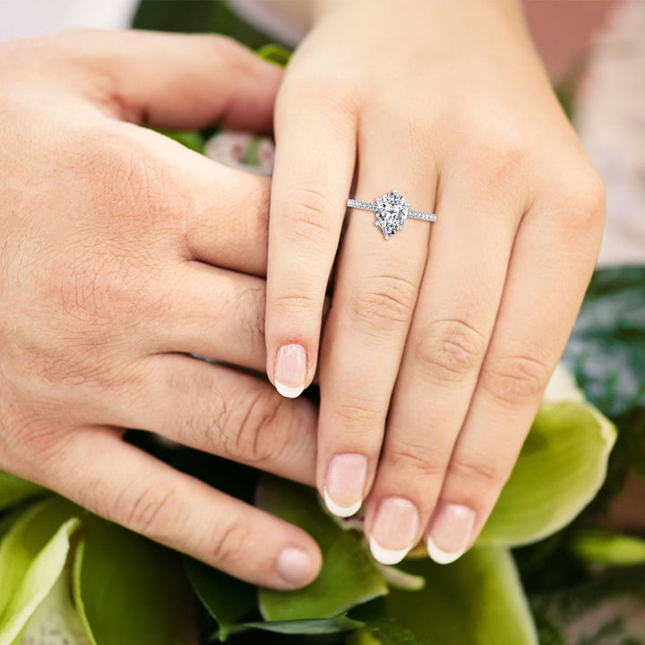 Pear Shape Engagement Ring with Round Side Stones