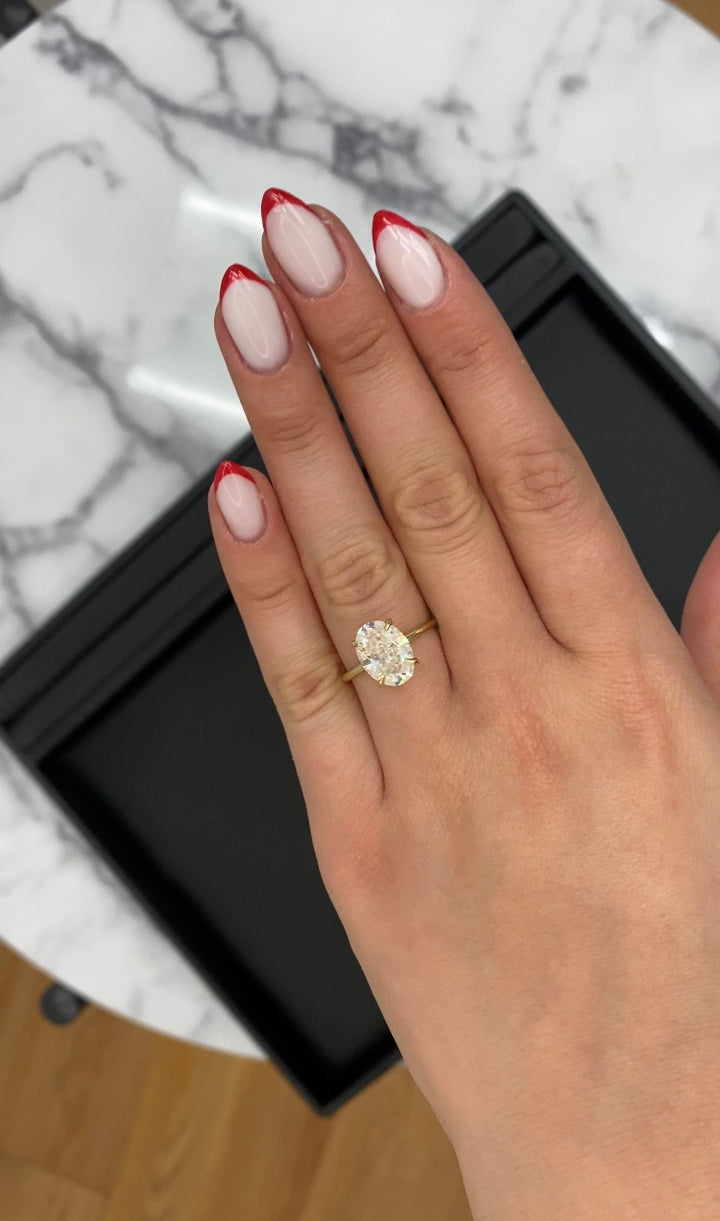 Oval Cut Solitaire Engagement Ring