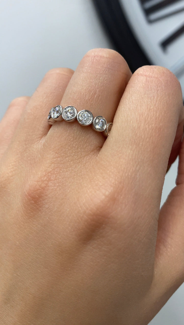 Round Cut Bezel Set Eternity Band