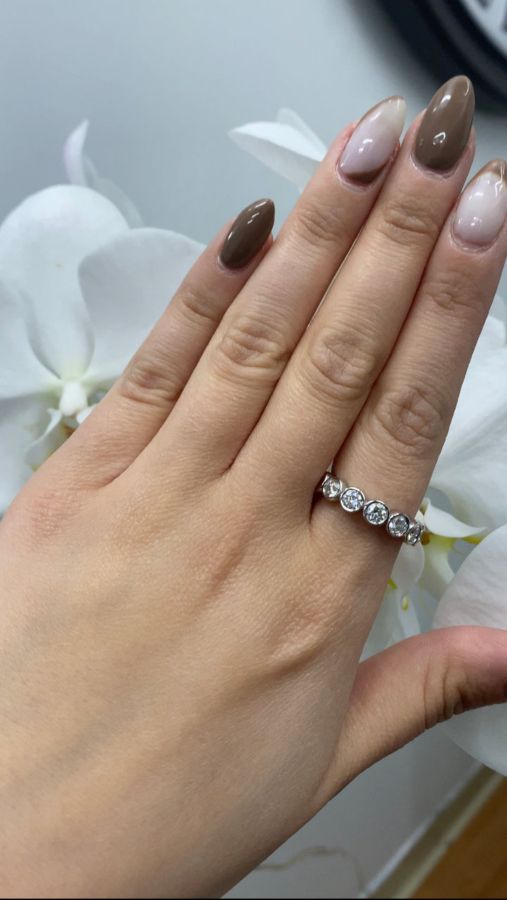Round Cut Bezel Set Eternity Band
