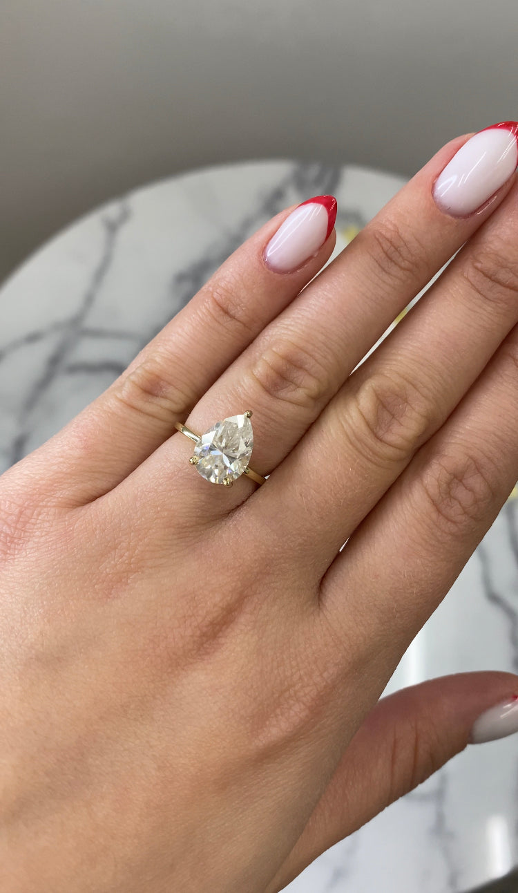 Pear Shape Engagement Ring with Hidden Halo