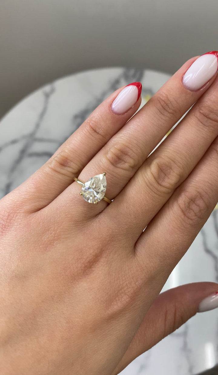 Pear Shape Engagement Ring with Hidden Halo