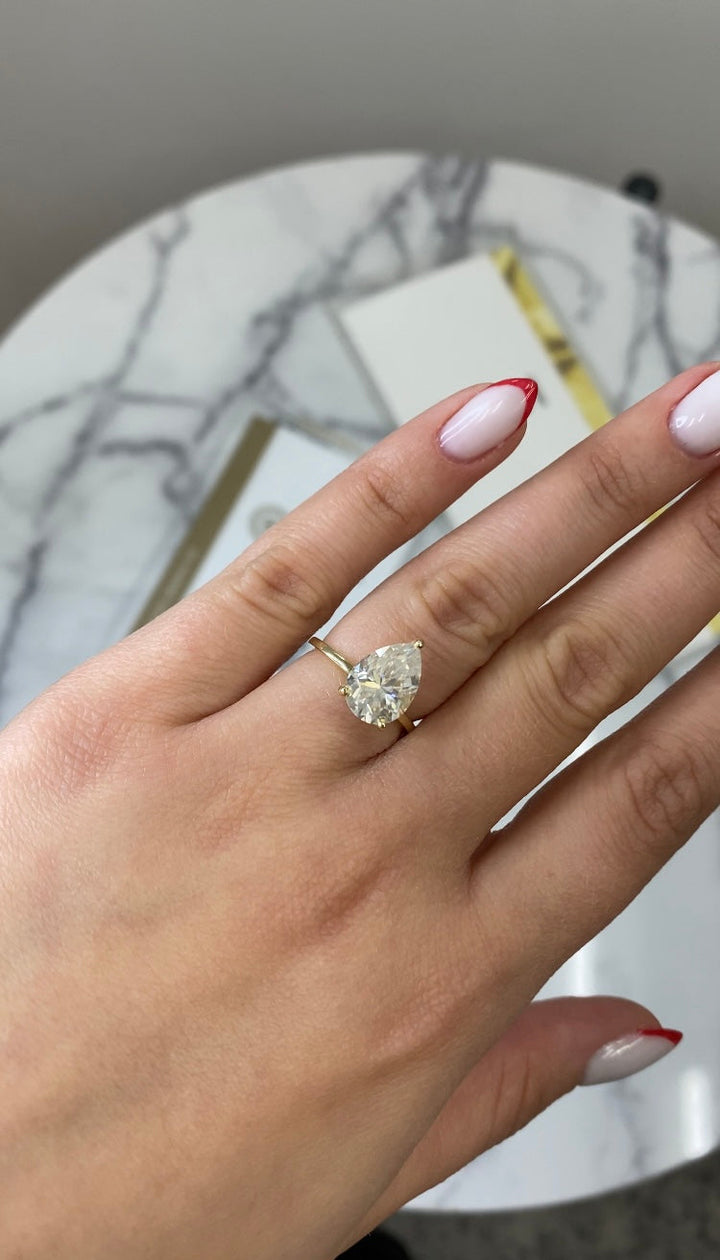 Pear Shape Engagement Ring with Hidden Halo