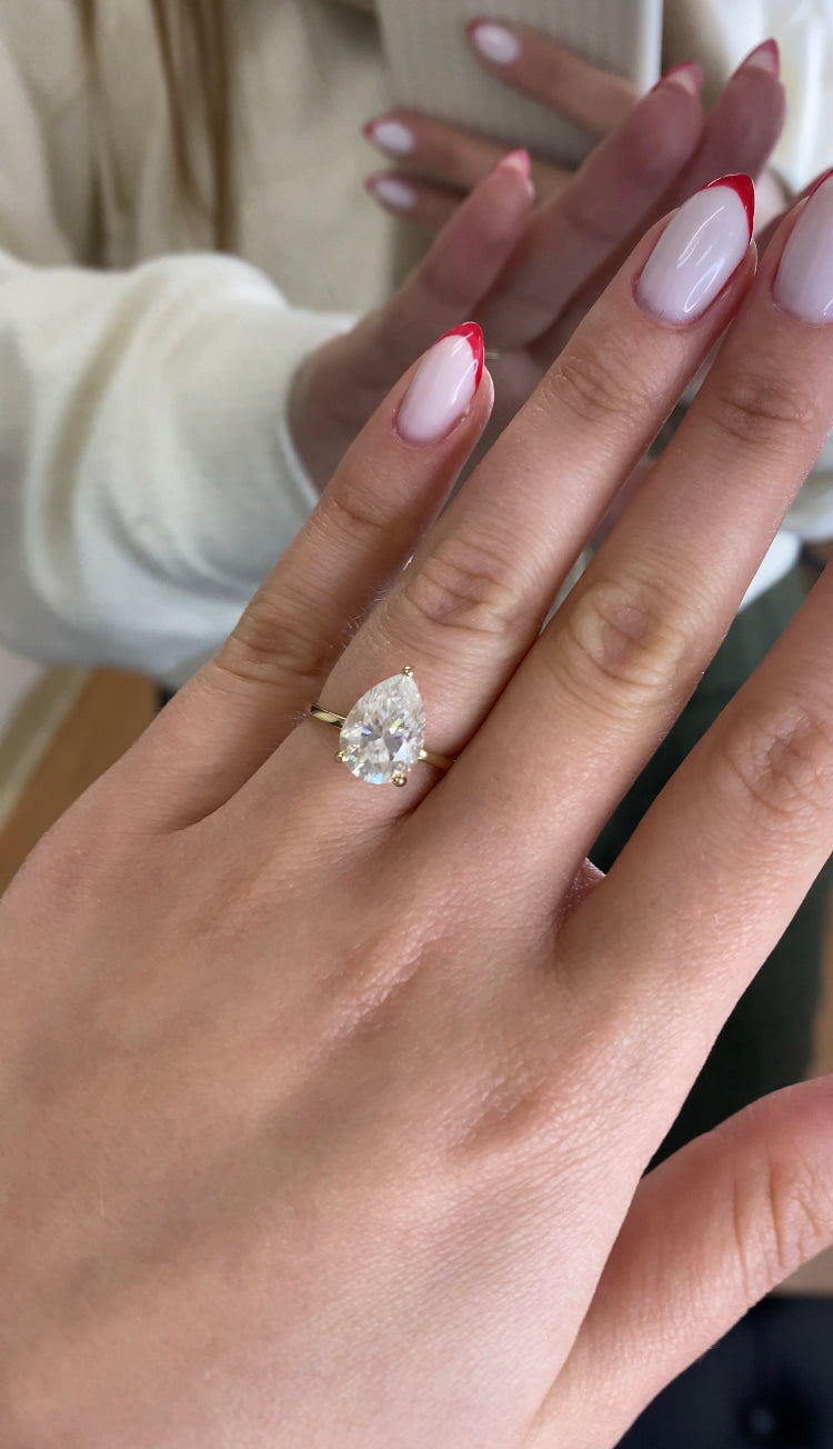 Pear Shape Engagement Ring with Hidden Halo