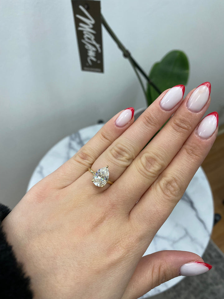 Pear Shape Engagement Ring with Hidden Halo