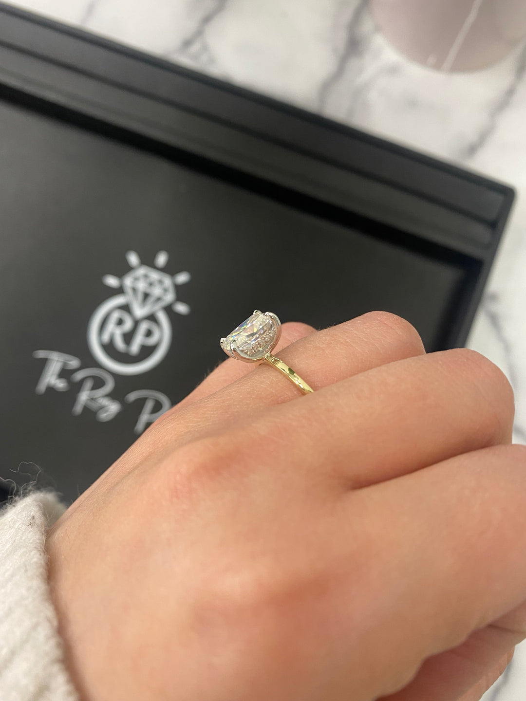 Two Tone Elongated Cushion Cut Engagement Ring with Thin Band and Hidden Halo