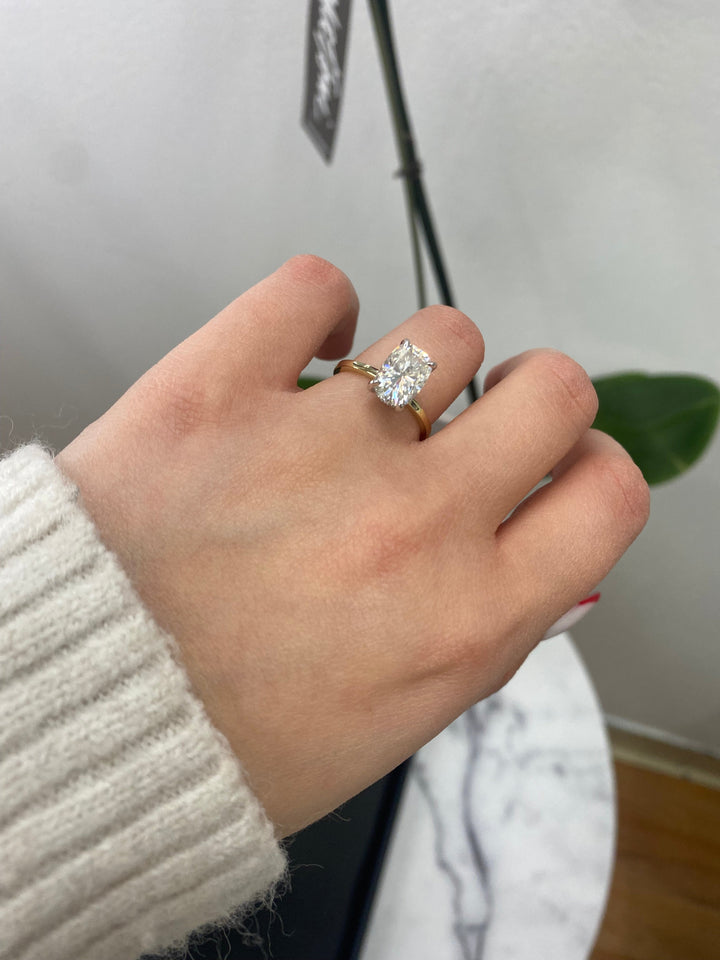 Two Tone Elongated Cushion Cut Engagement Ring with Thin Band and Hidden Halo