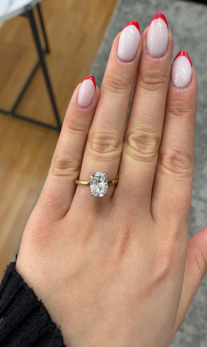 Two Tone Elongated Cushion Cut Engagement Ring with Thin Band and Hidden Halo