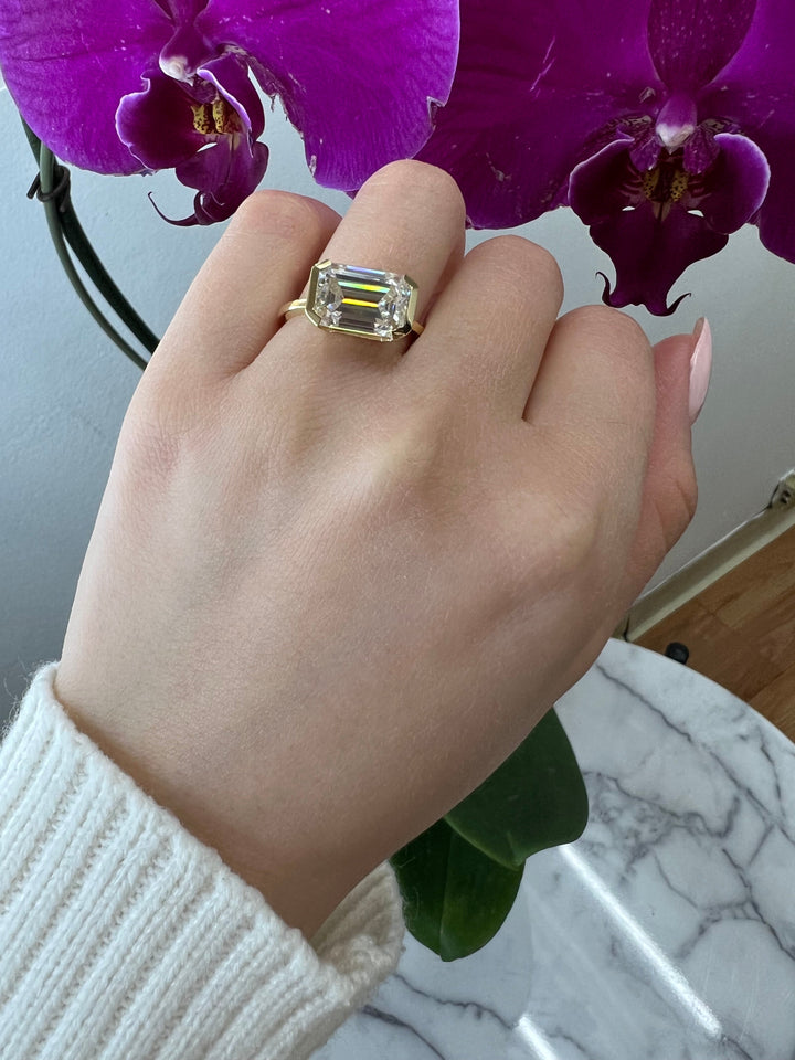 Bezel Set Emerald Cut Engagement Ring East to West