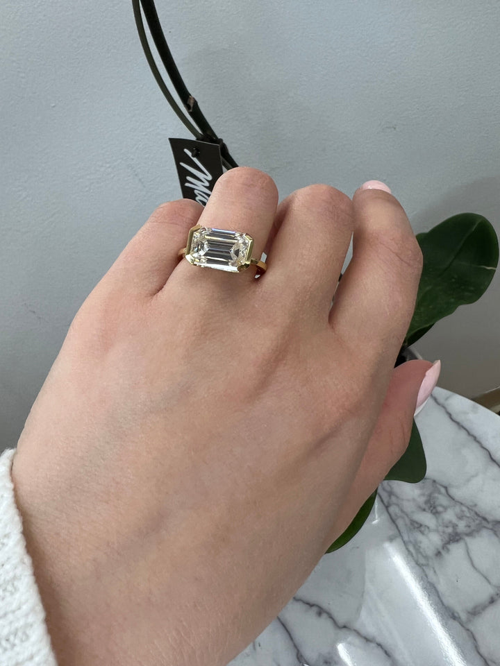 Bezel Set Emerald Cut Engagement Ring East to West