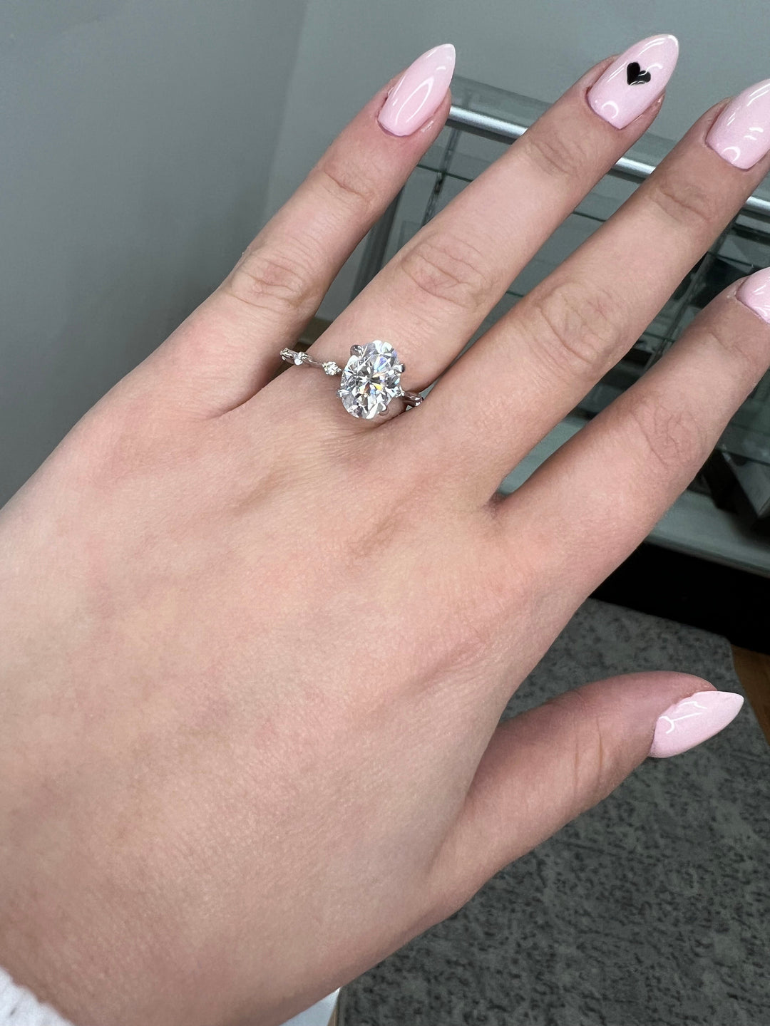 Oval Cut Engagement Ring Thin Band with Round Stones