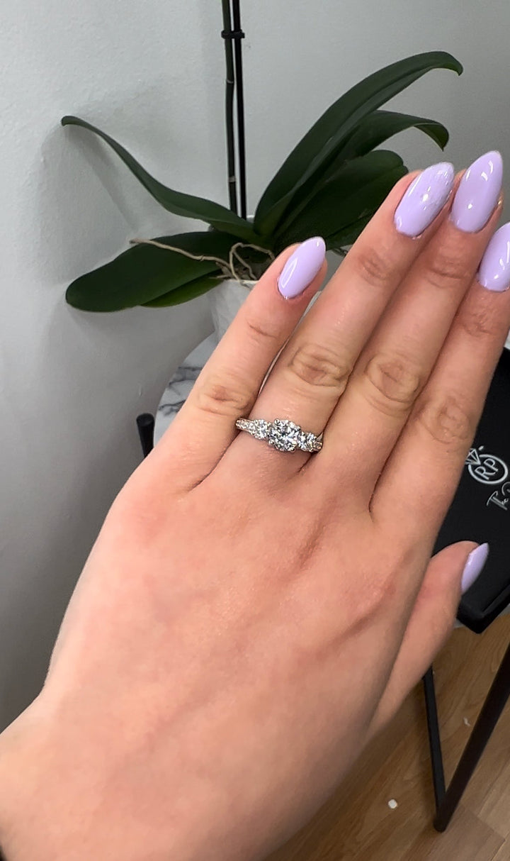 Round Cut Engagement Ring With Sidestones