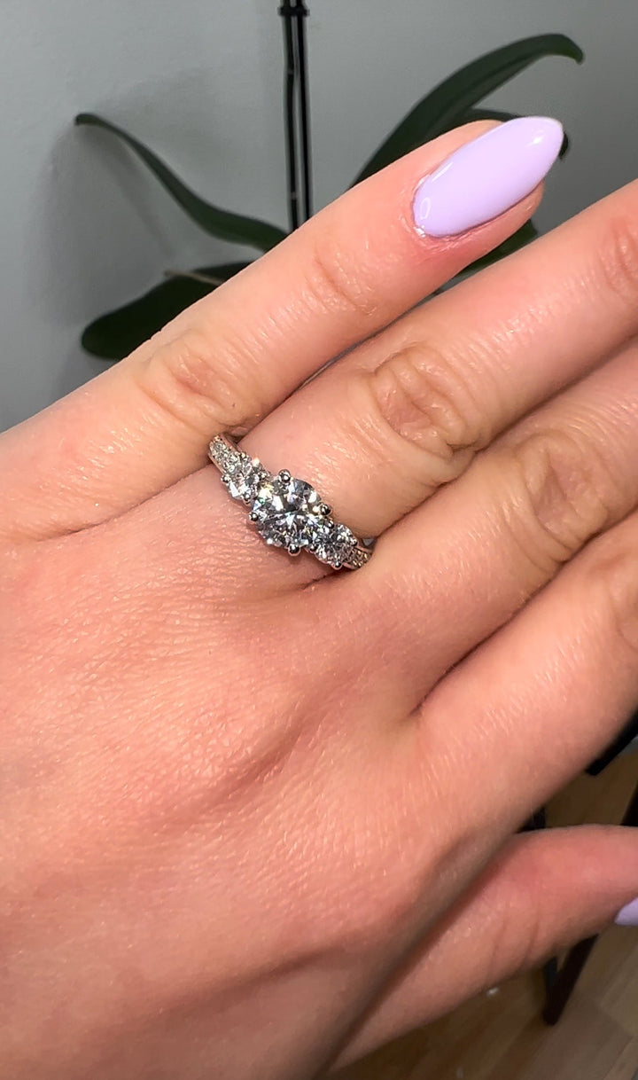 Round Cut Engagement Ring With Sidestones