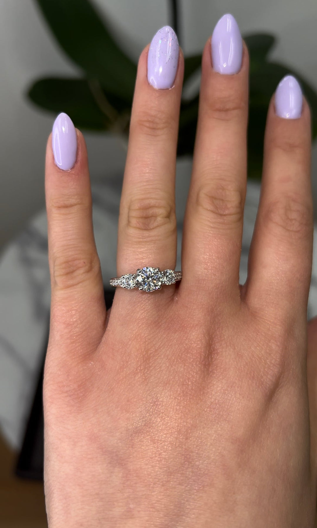 Round Cut Engagement Ring With Sidestones