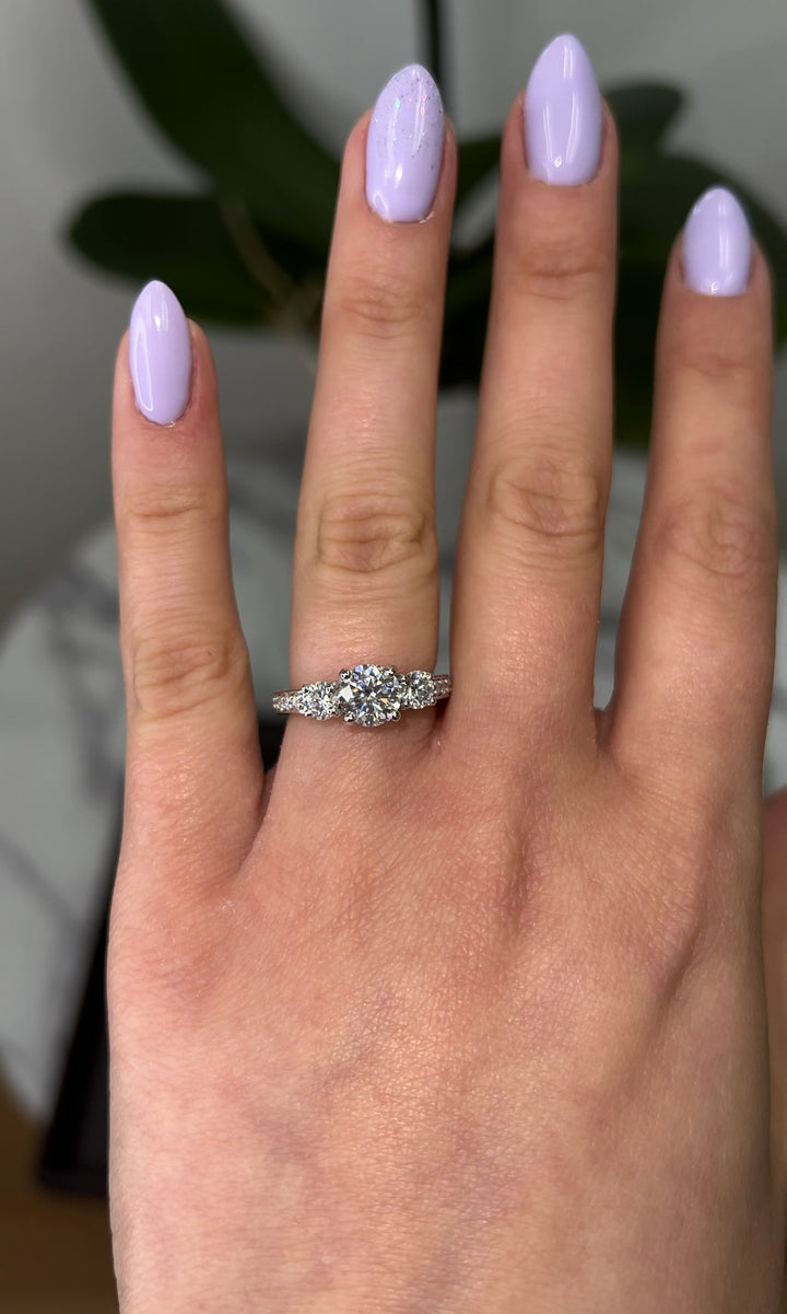 Round Cut Engagement Ring With Sidestones