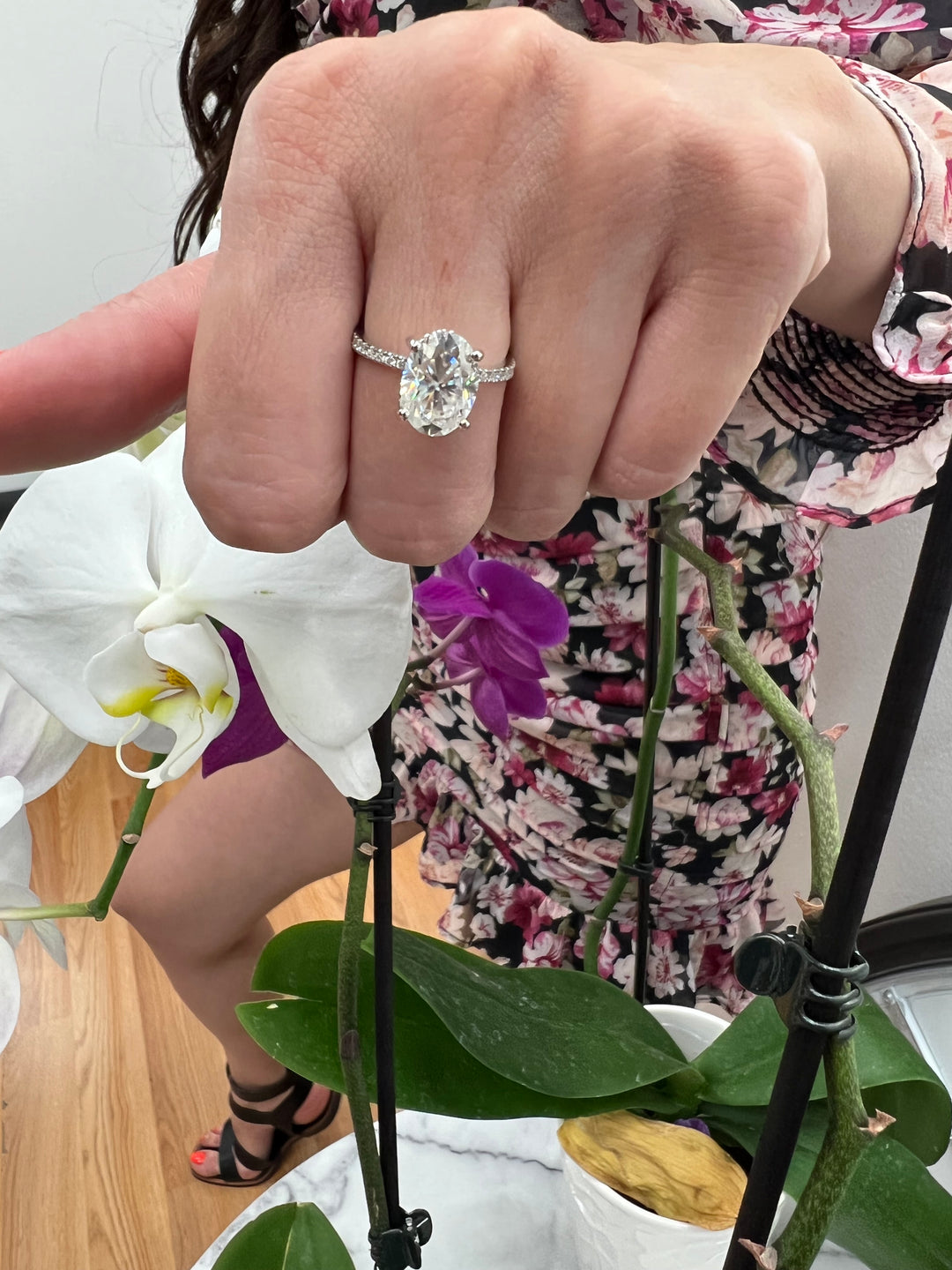 Oval Cut Invisible Halo Engagement Ring with Sidestones