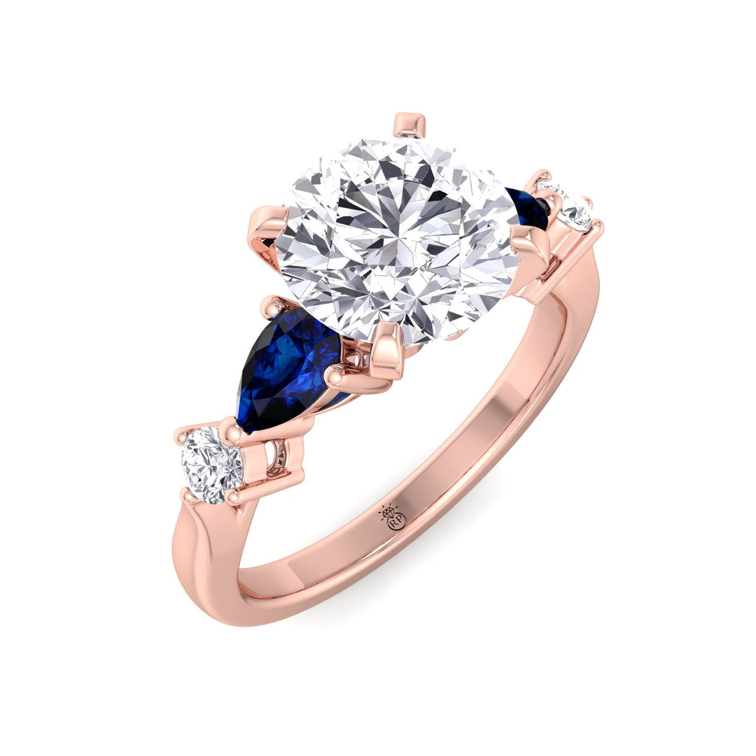 Round Cut Engagement Ring with Blue Sapphire Pear Shape Sidestones