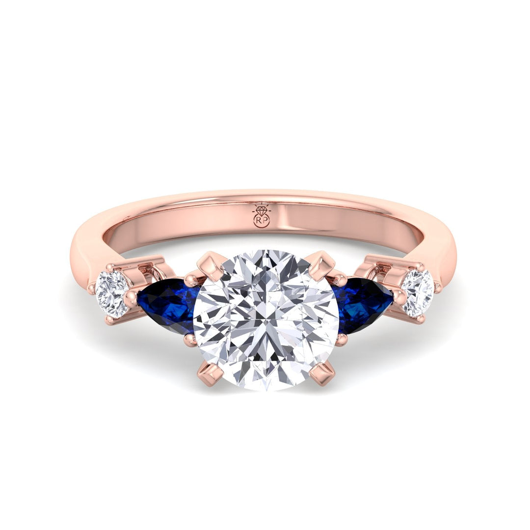 Round Cut Engagement Ring with Blue Sapphire Pear Shape Sidestones