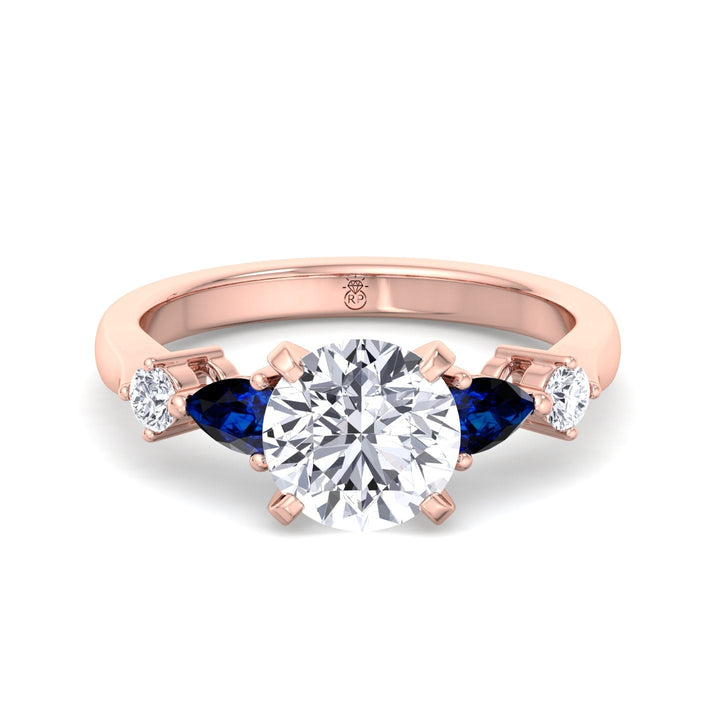 Round Cut Engagement Ring with Blue Sapphire Pear Shape Sidestones