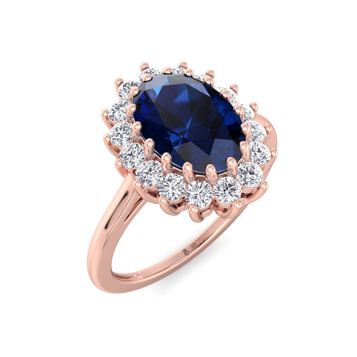 Oval Cut Blue Sapphire &amp; Halo Engagement Ring