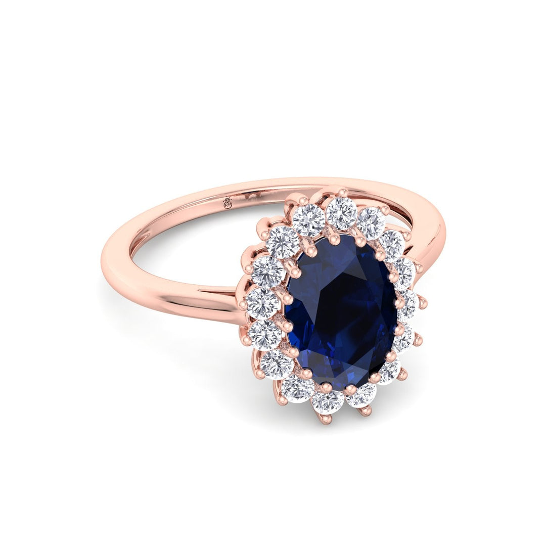 Oval Cut Blue Sapphire &amp; Halo Engagement Ring